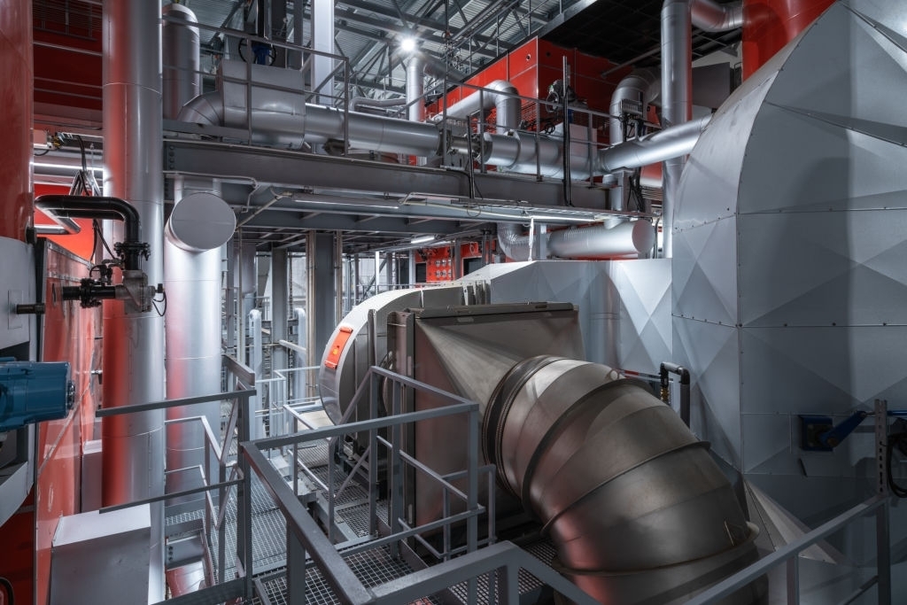 Scaffolding Surrounding Large HVAC Structure In A Warehouse