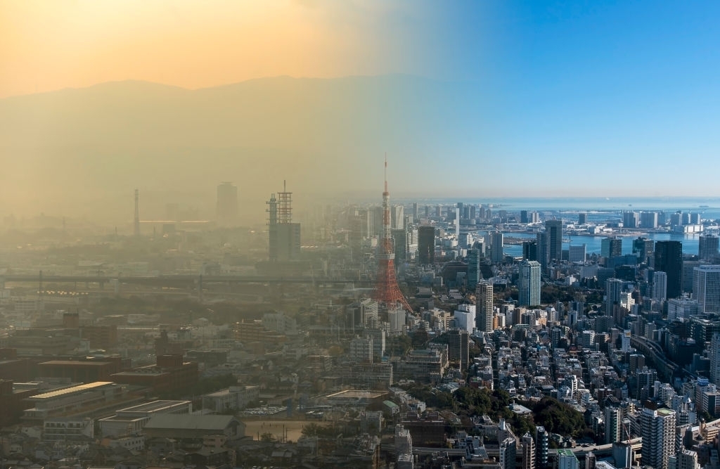 Aerial View of Polluted City to Clear Skies