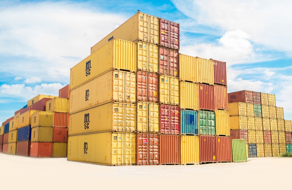 Stacks of Yellow Orange, Red, Blue And Green Containers