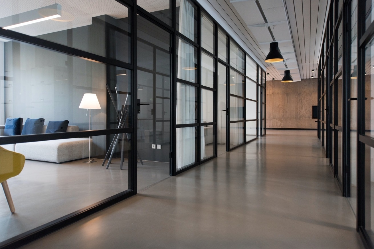 Hallway of Modern Office Building With Conference Rooms With Windows
