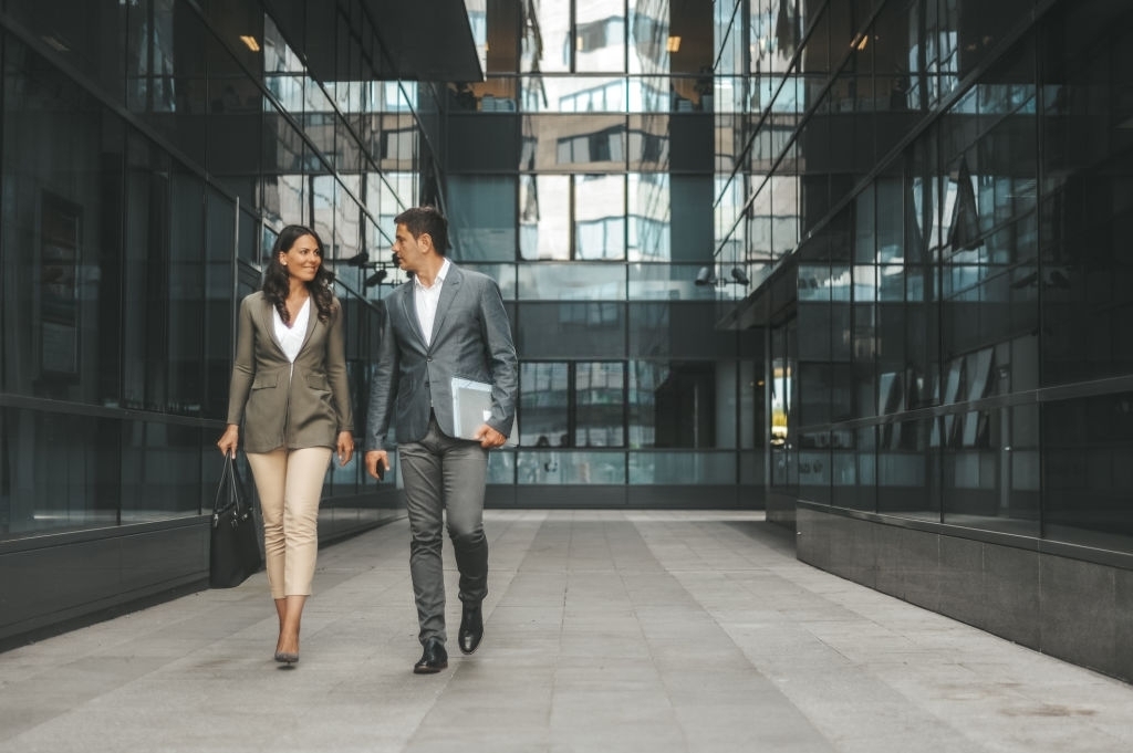 Business-Women-and-Business-Man-Leaving-Office-Co-Workers-Tower-Street-Insurance-Dallas-TX