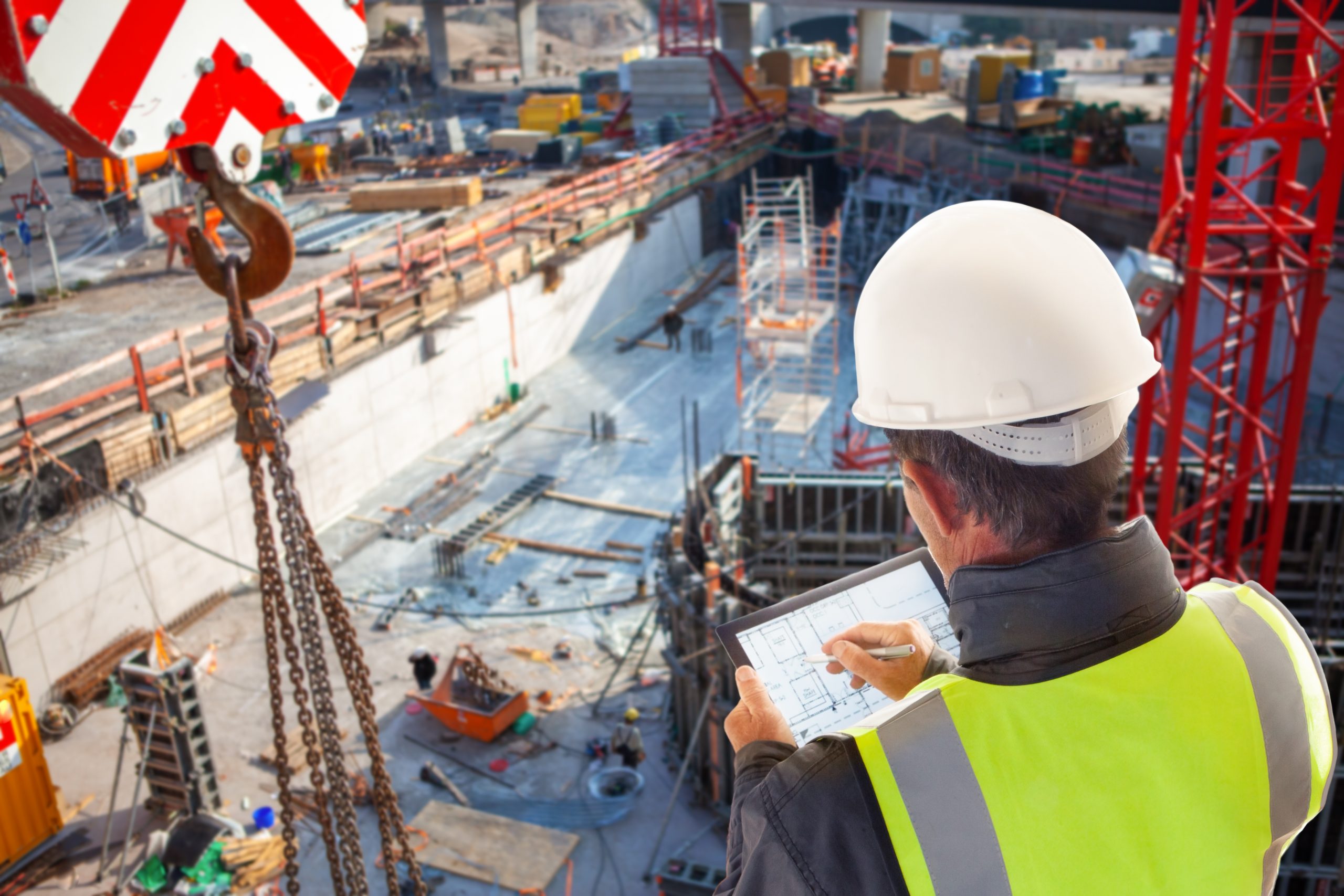 Engineer,Architect,Foreman,On,Construction,Site,With,Tablet,Computer