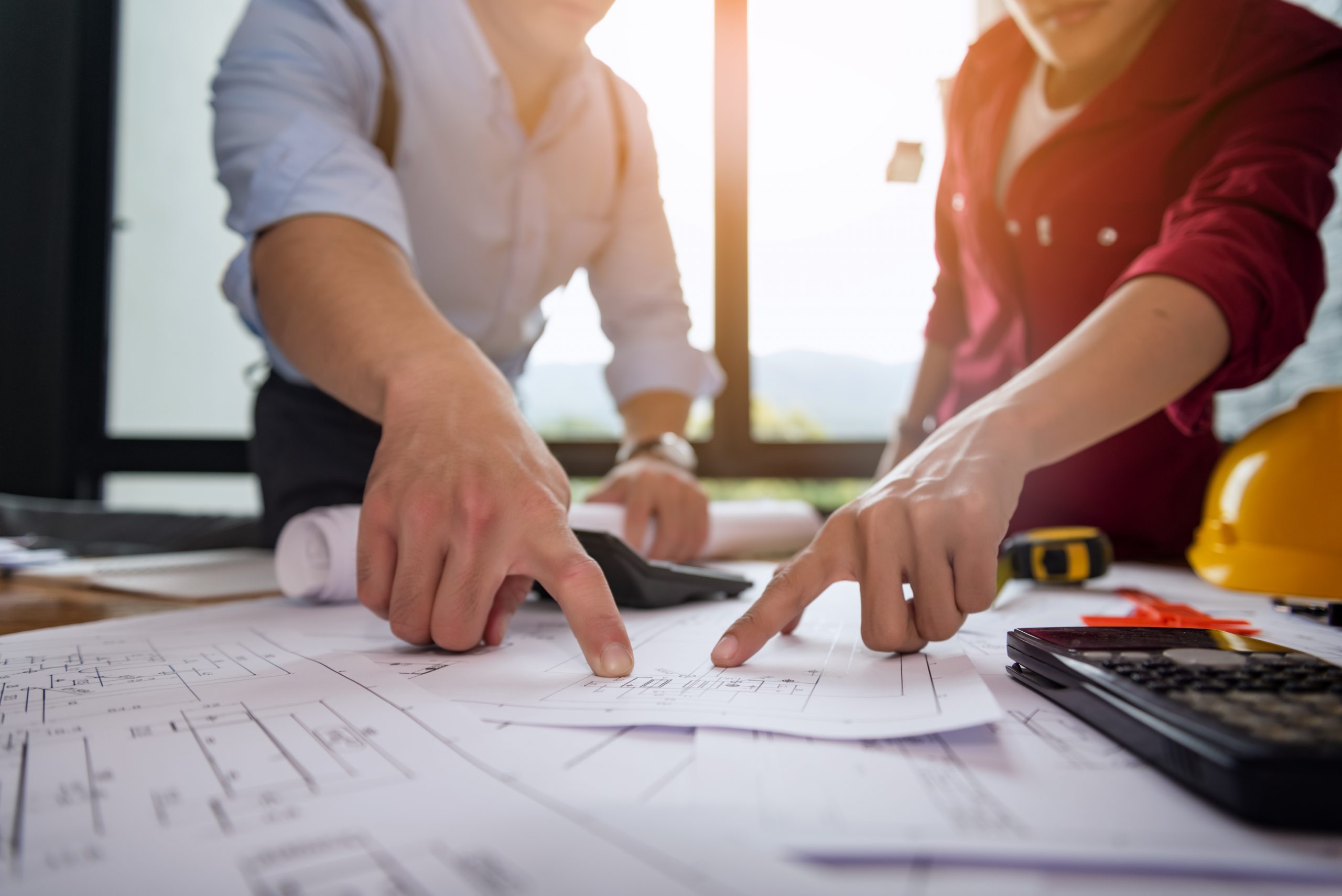 Engineer,People,Meeting,Working,And,Pointing,At,A,Drawings,In Engineer,People,Meeting,Working,And,Pointing,At,A,Drawings,In
