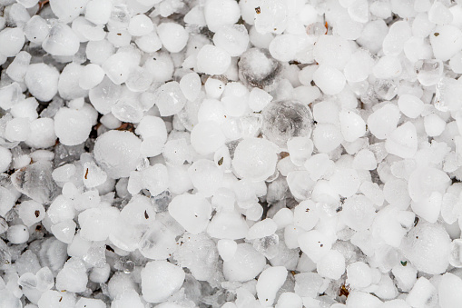 Hailstorm in summer. Close up on hailstones.