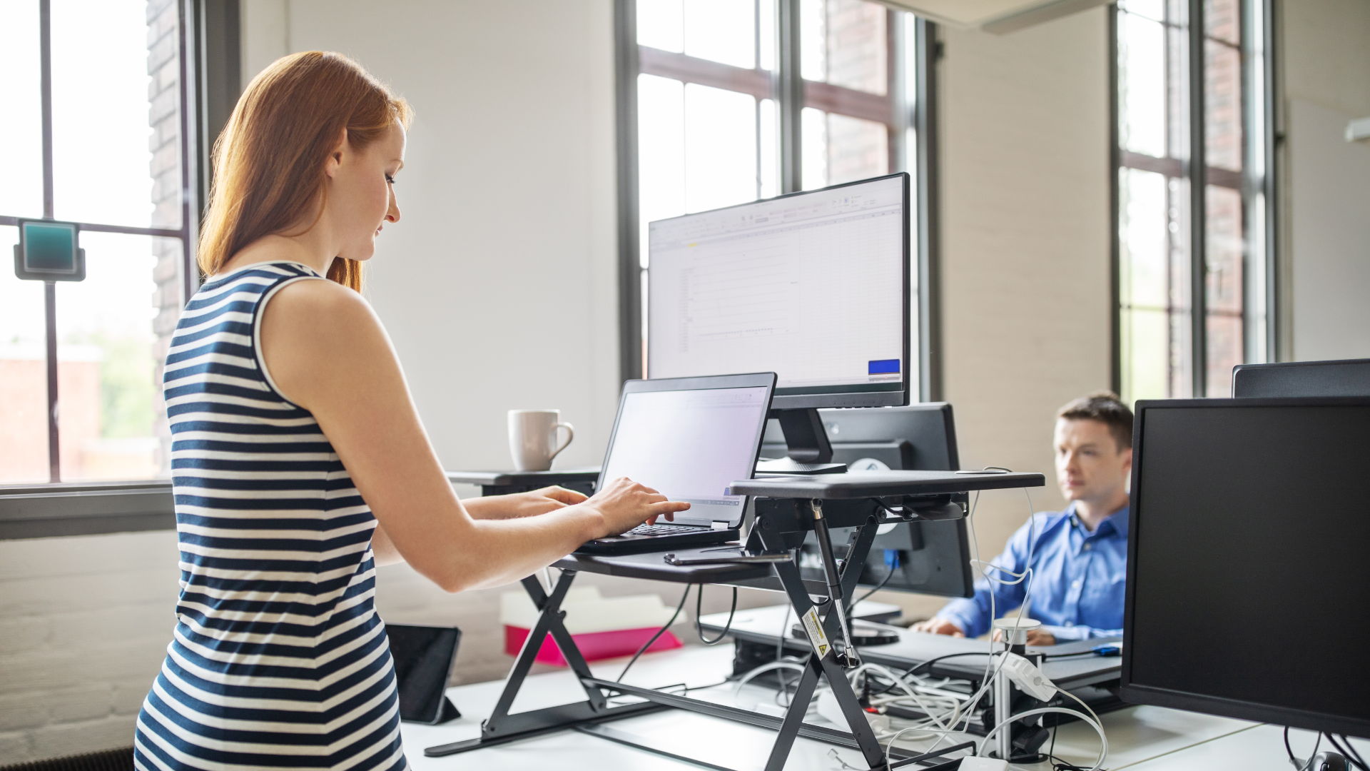 Woman Working at Standing Desk