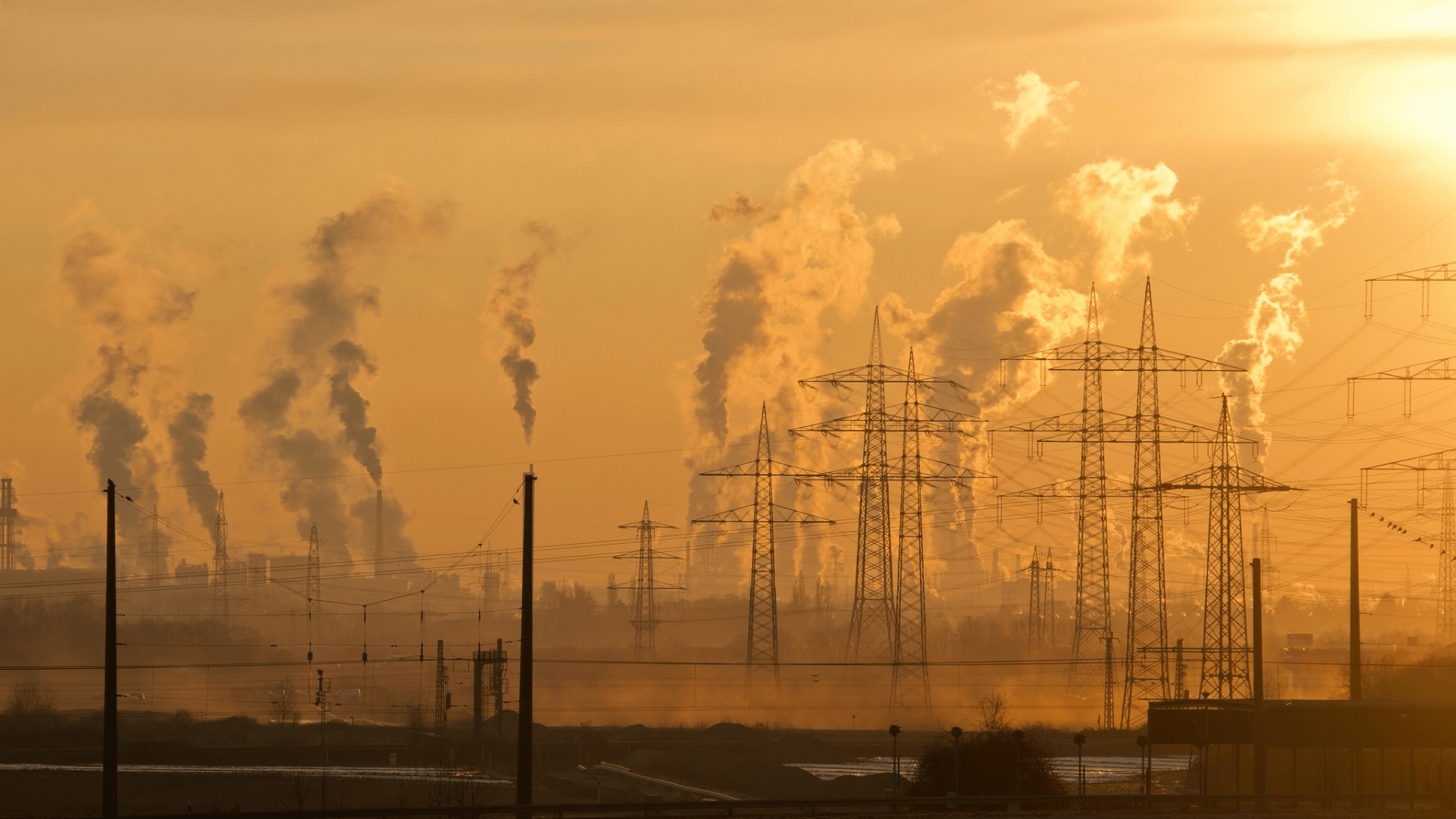 Industrial Plant Polluting Air at Dusk