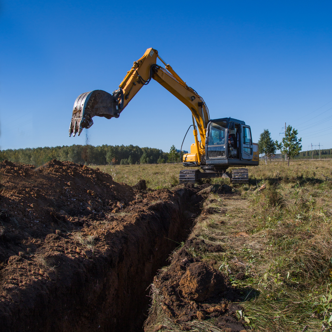 Machine digging a trench Machine digging a trench