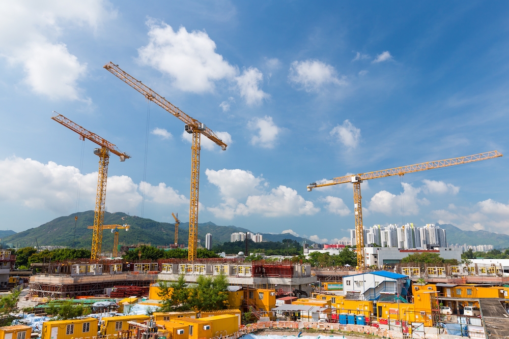 Construction site and skyline Tower Street Insurance Loss Control OSHA Safe and Sound Week Safety and Health