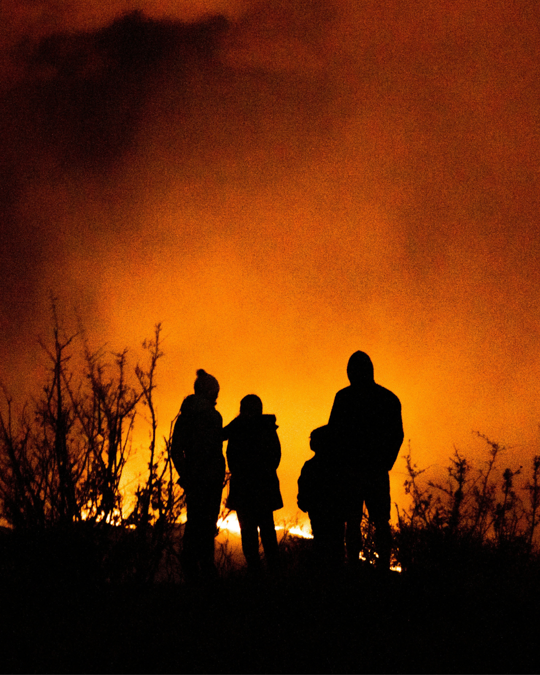 Family Watching Fire in Dark Tower Street Insurance Loss Control OSHA Safe and Sound Week