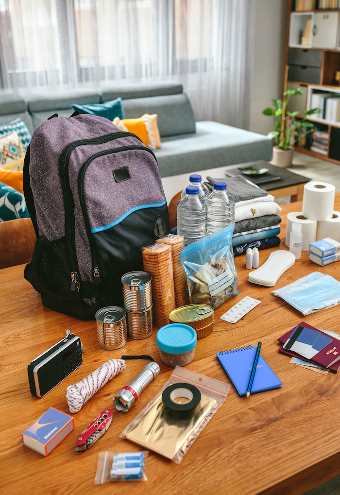 Emergency backpack equipment organized on the table Tower Street Insurance Loss Control OSHA Safe and Sound Week