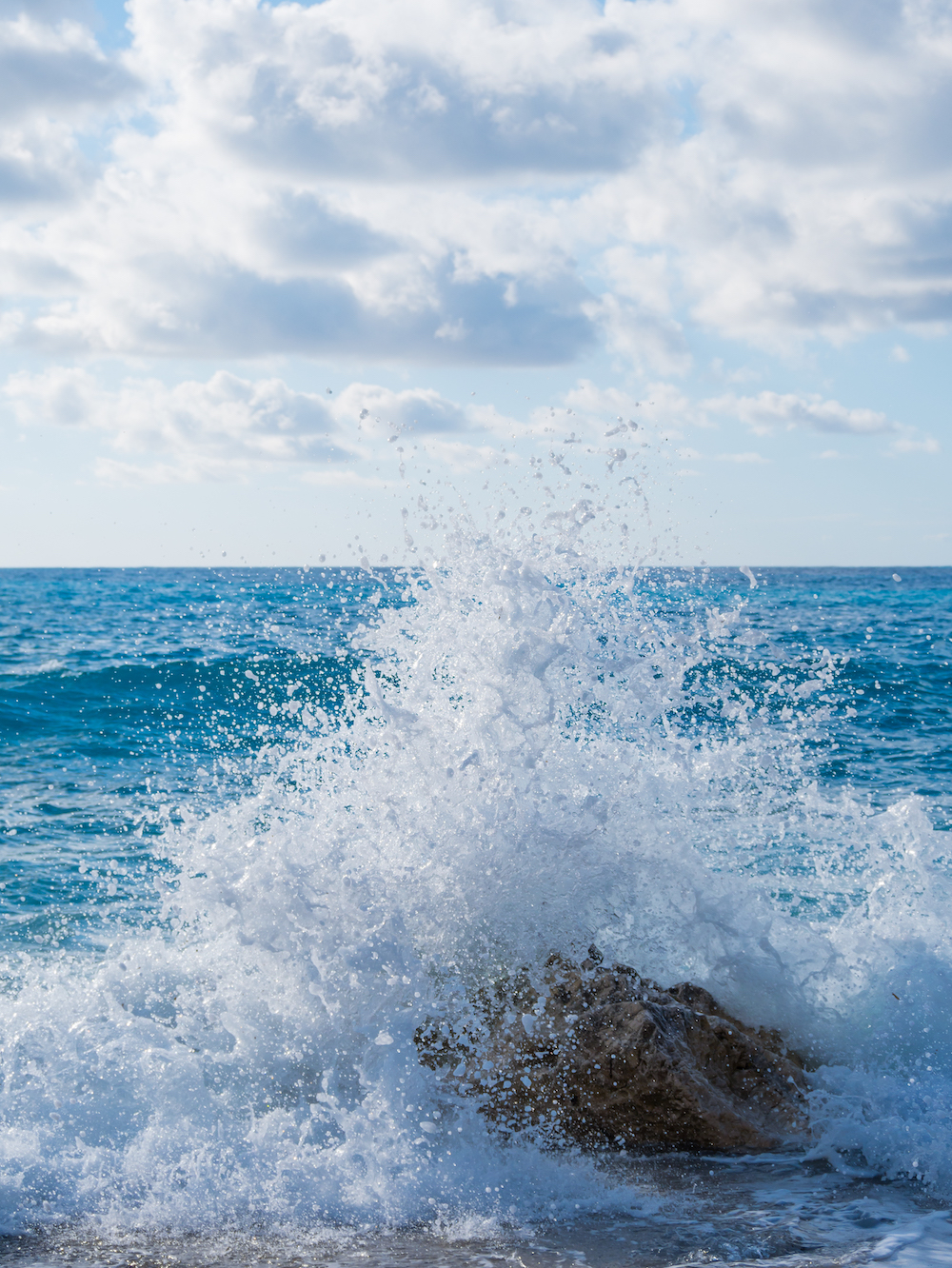 waves breaking on a stony beach Tower Street Insurance Loss Control OSHA Safe and Sound Week